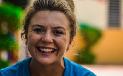 Image of a happy woman who makes money doing what she does best.