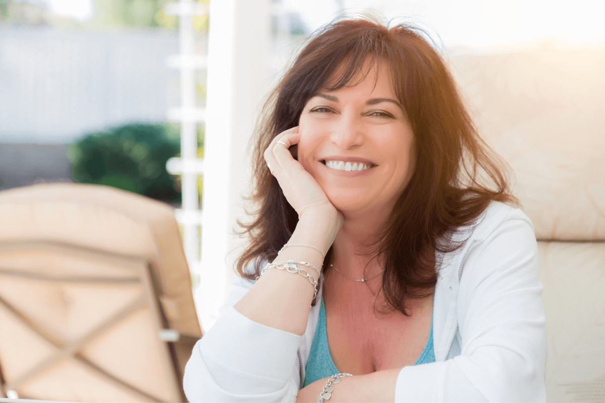 Happy Midlife Woman Midlife woman smiling, feeling good about her lifestyle